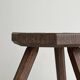 Small dark wooden tripod stool