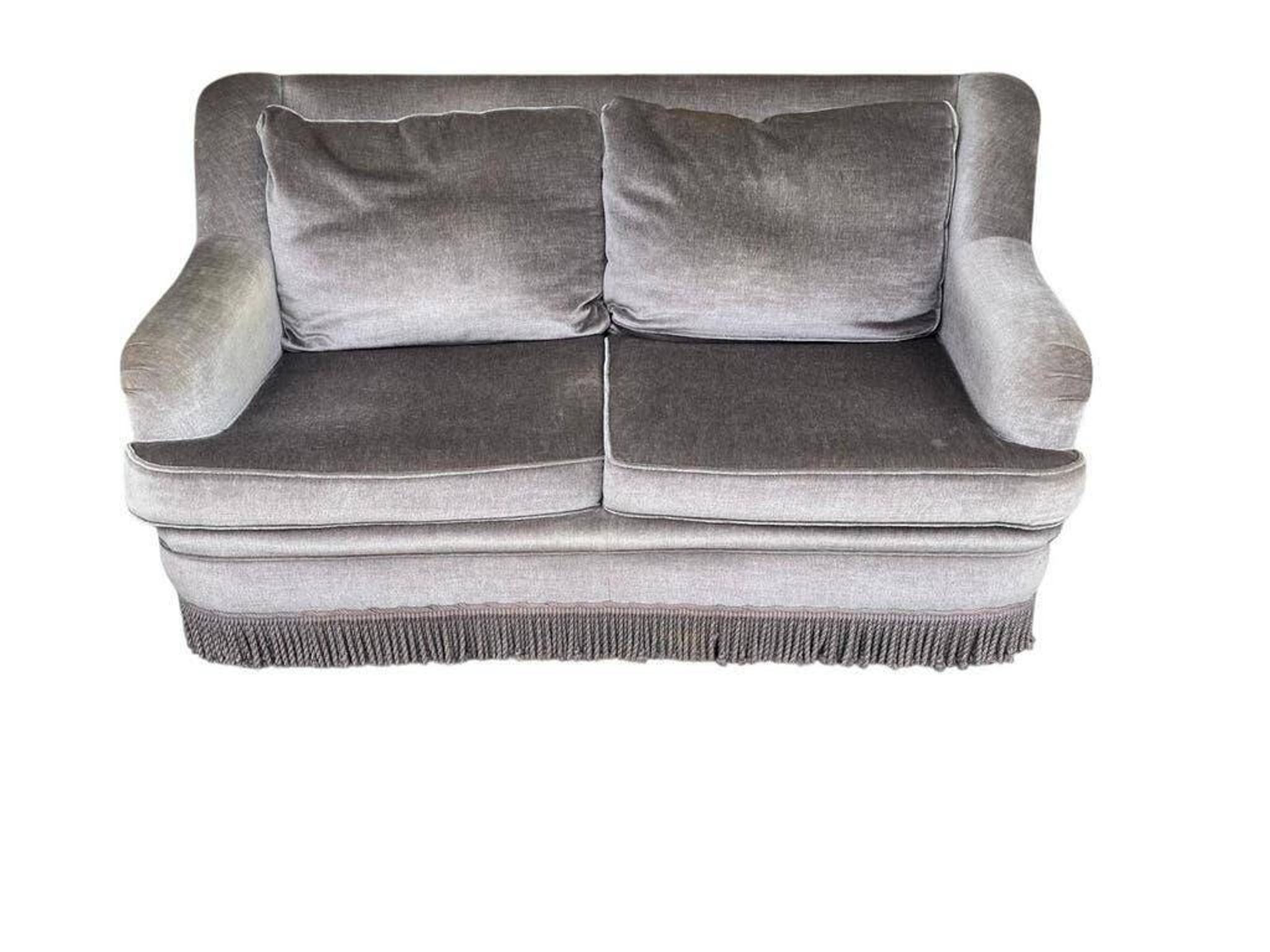 Vintage taupe two-seater armchair/sofa with fringes.