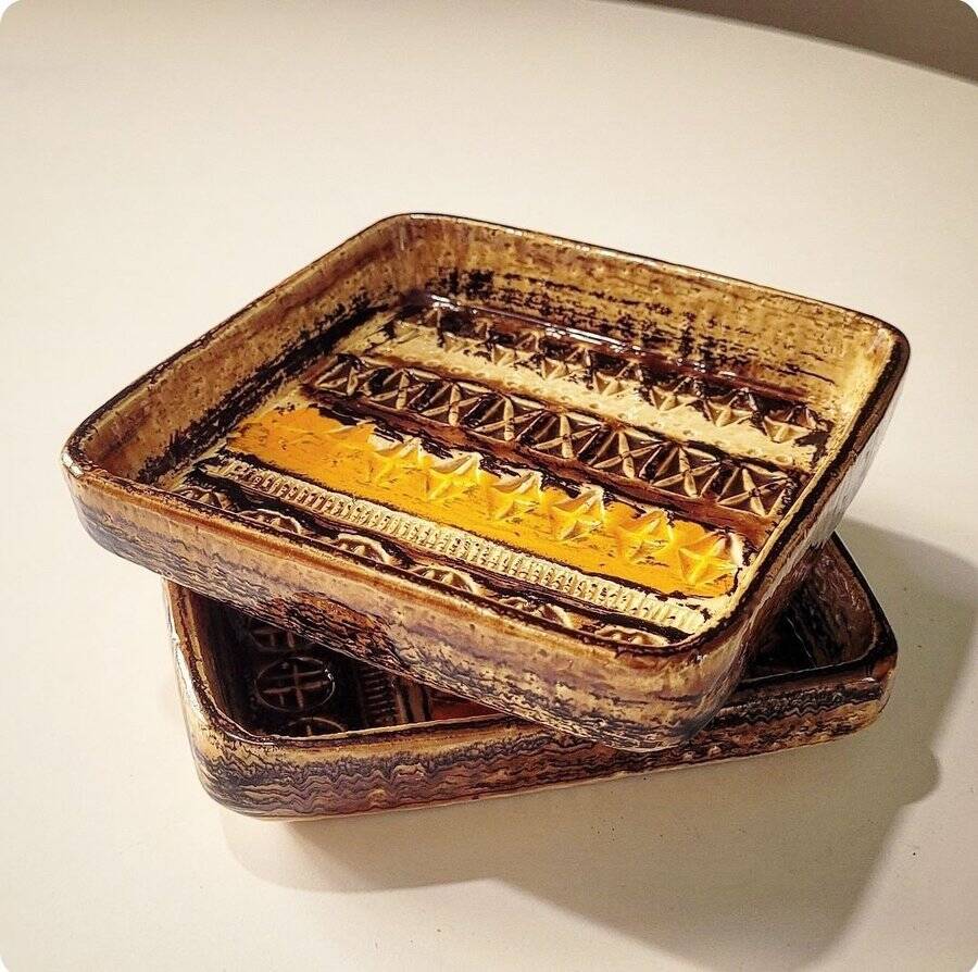 Pair of Aldo Londi pocket emptiers