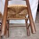 Brutalist chairs in walnut and straw
