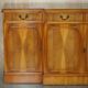 Vintage buffet made of mottled yew wood with three doors and four drawers.
