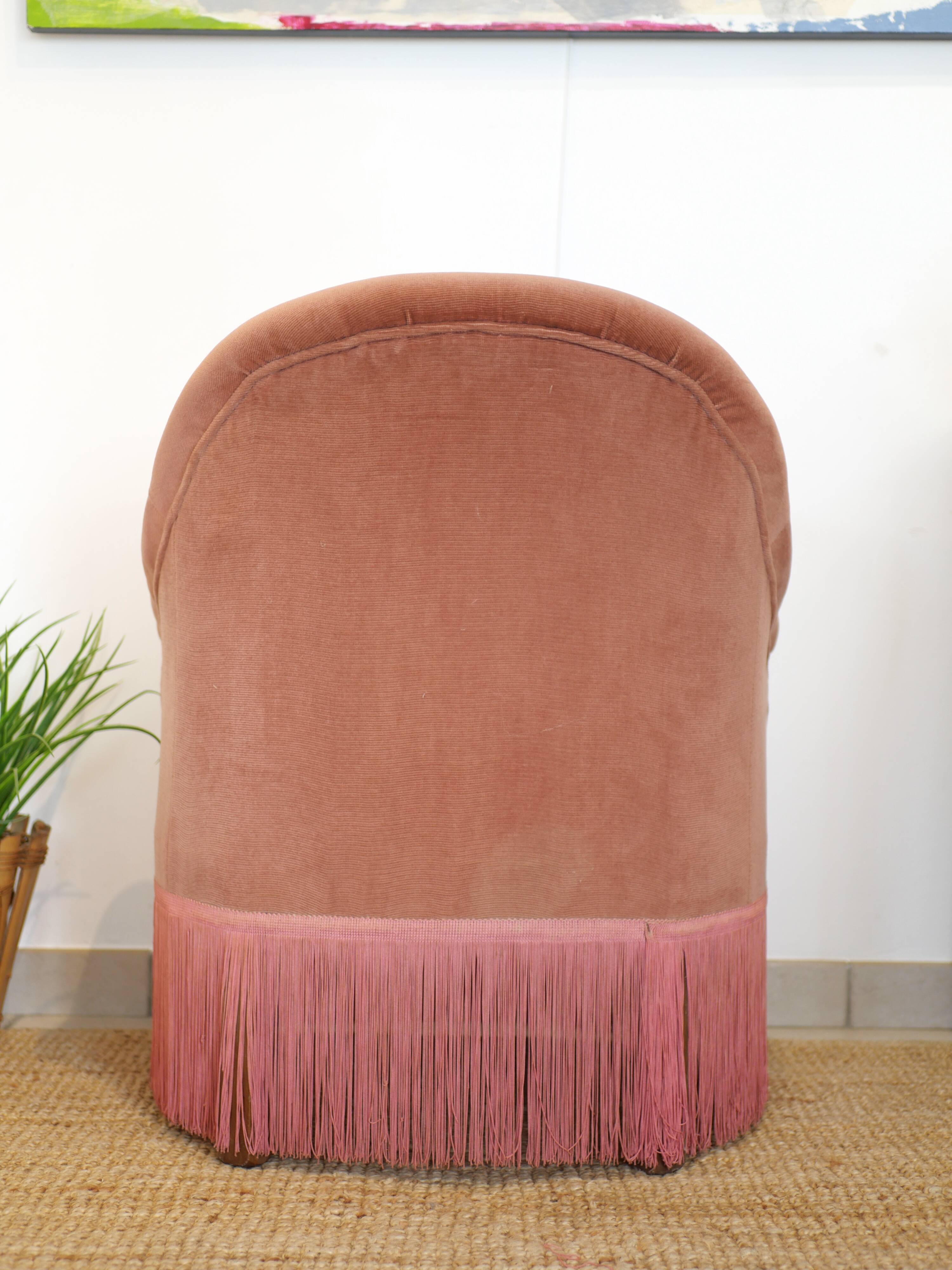 Pink velvet armchair
