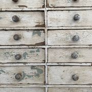 Meuble de métier ancien en bois à 16 tiroirs