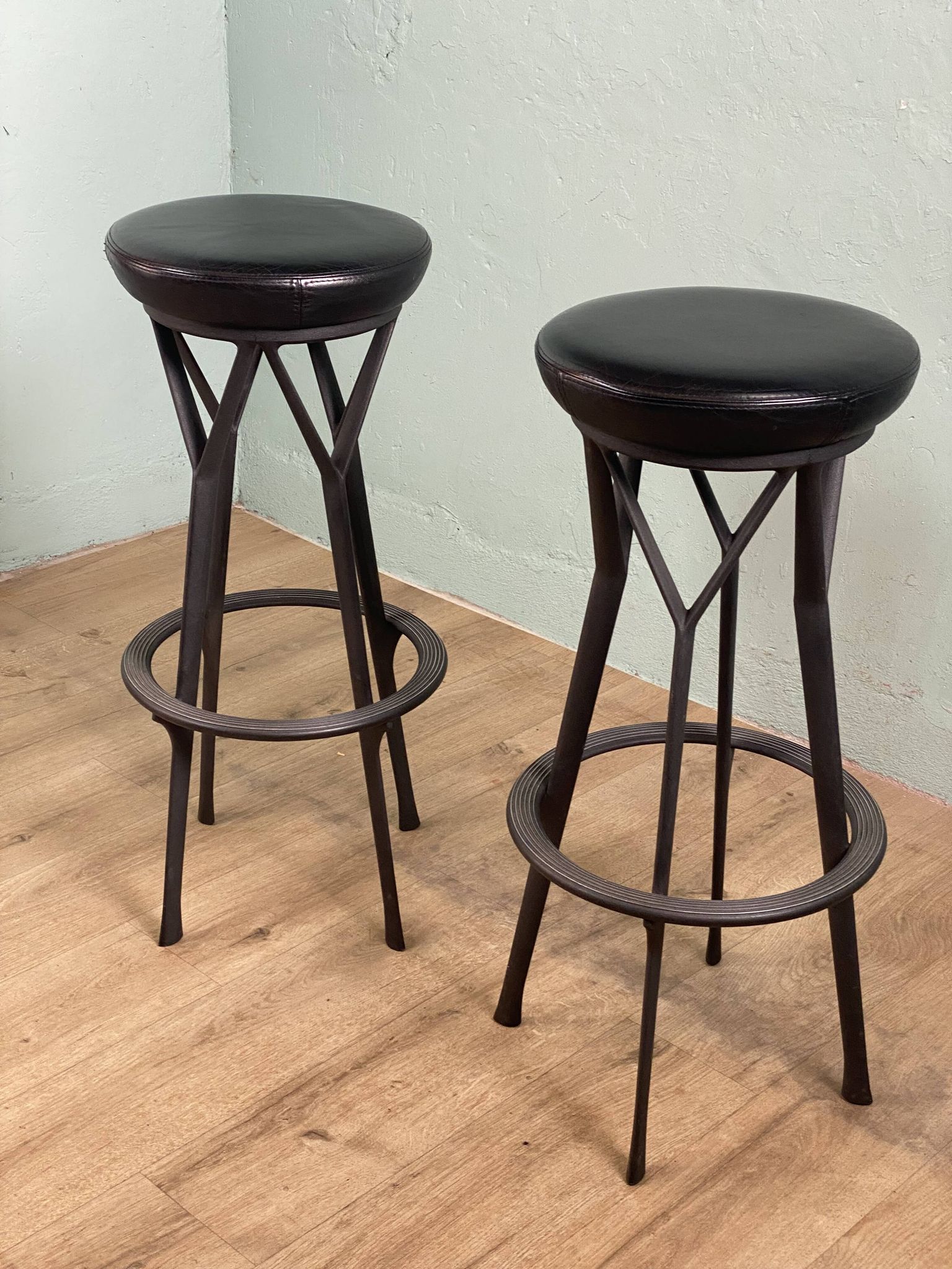 2 Yamakado designer swivel stools in black leather