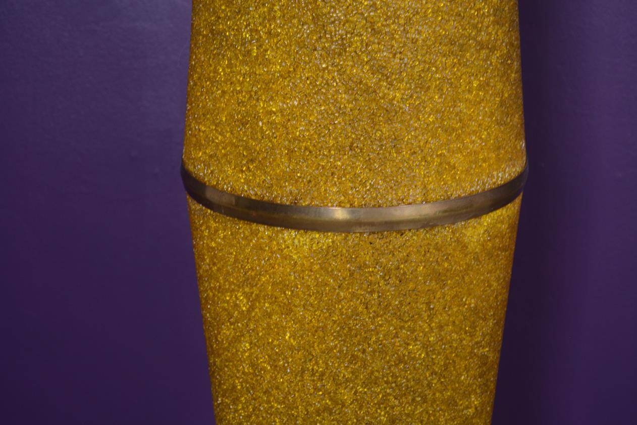 Totem floor lamp from the 60s in yellow granite methacrylate.