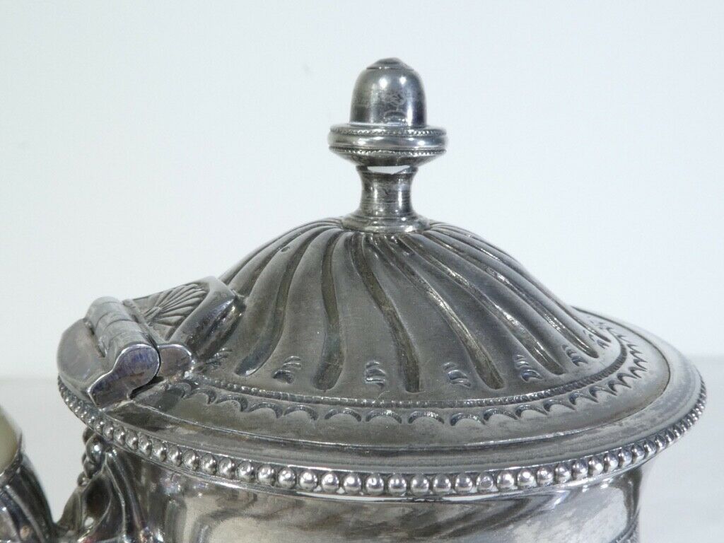 Silver flat silver metal teapot