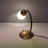 Beautiful table lamp, estimated from the 1950-60s. Made of metal, brass and glass.
