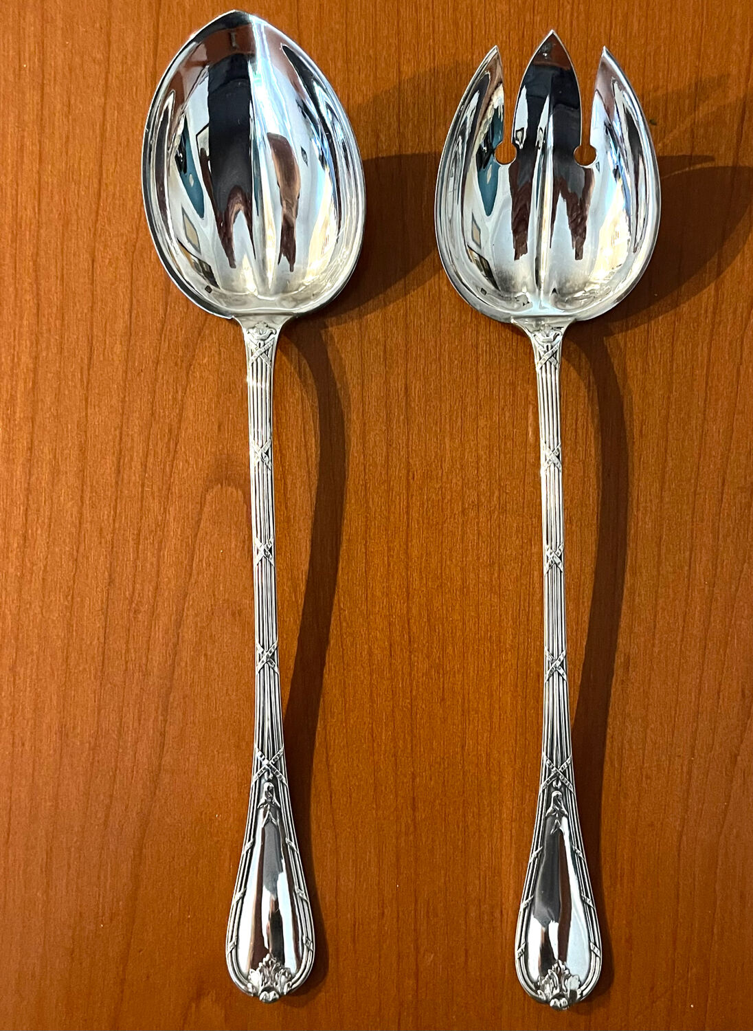 Christofle ribbon and bell-shaped salad serving pieces, very beautiful and