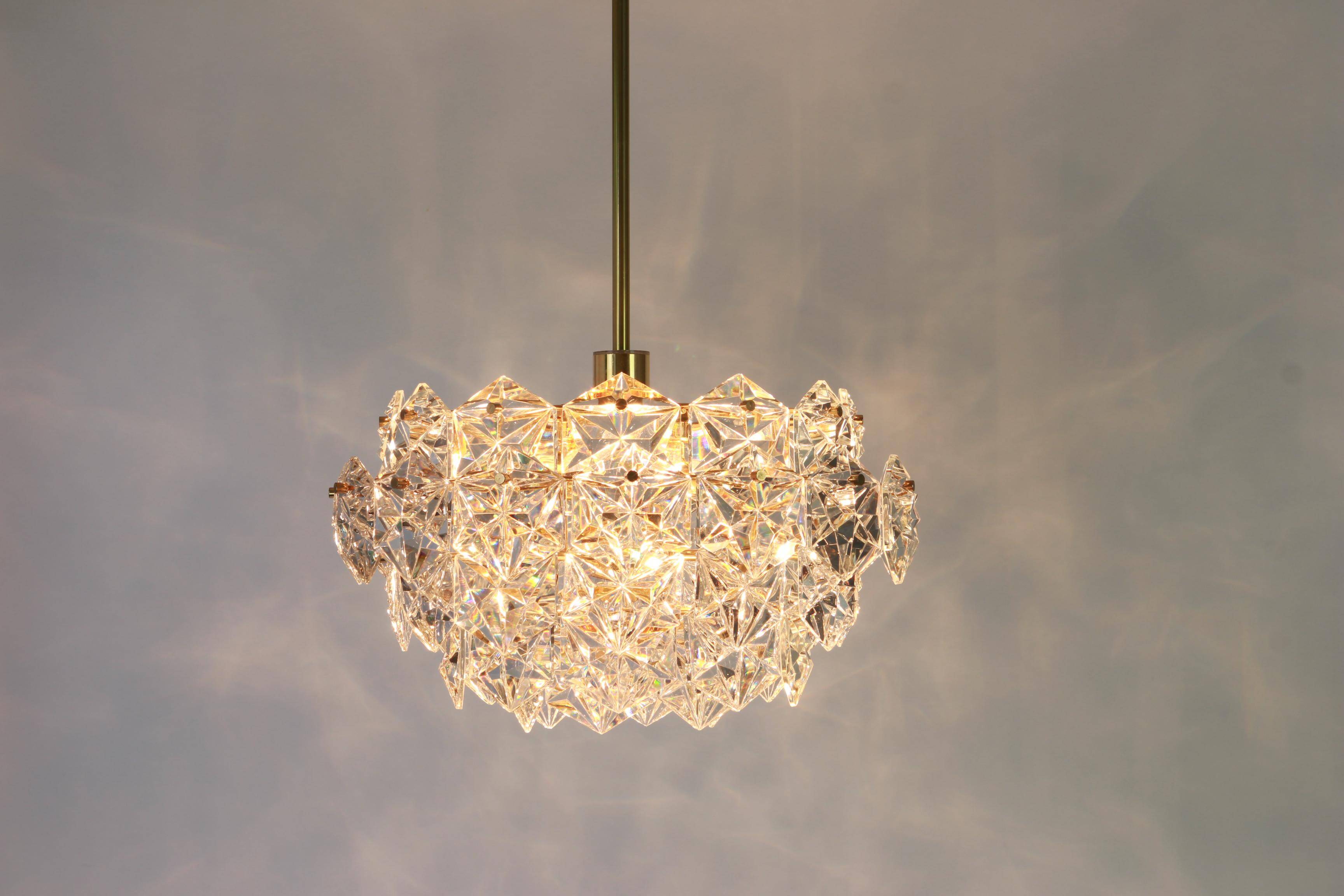 Chandelier in gilded brass and crystal glass by Kinkeldey, Germany, 1970s.