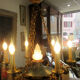 Empire style chandelier gilded bronze and green painted sheet metal