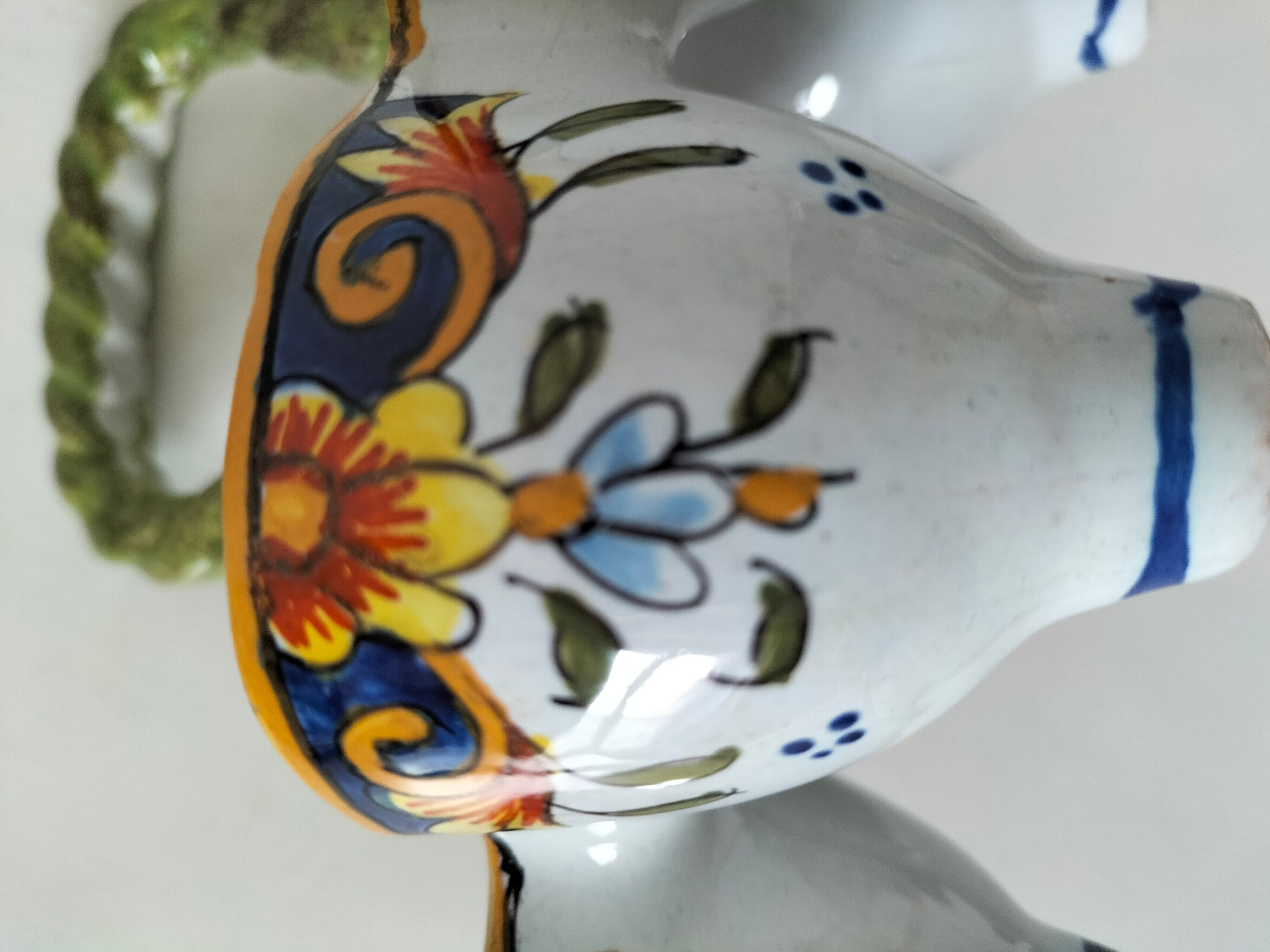 Antique egg holder by Jules Verlingue with polychrome floral decoration.