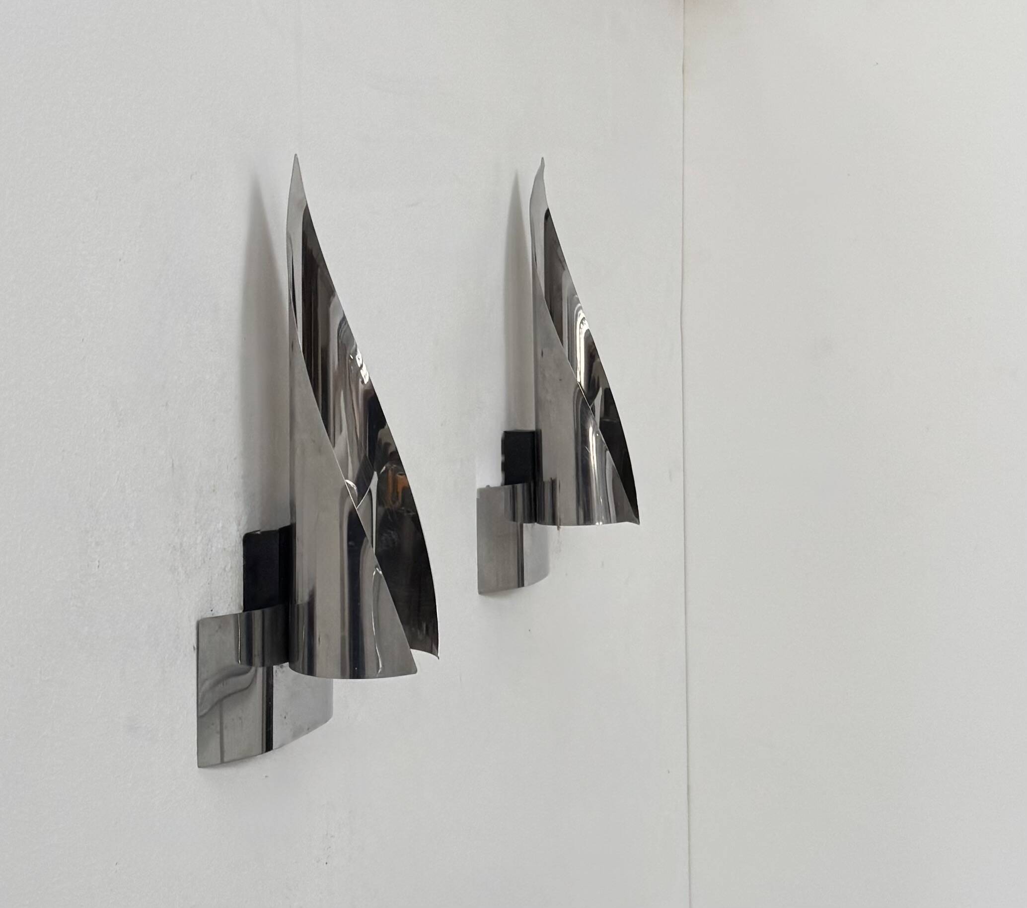 Pair of vintage wall lights, chrome metal, France, 1970.