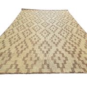 Vintage Touareg mat made of leather and reeds.