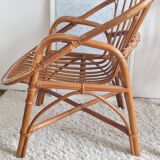Pair of vintage rattan armchairs circa the 1970s.