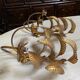 Pair of vintage golden palm leaf sconces