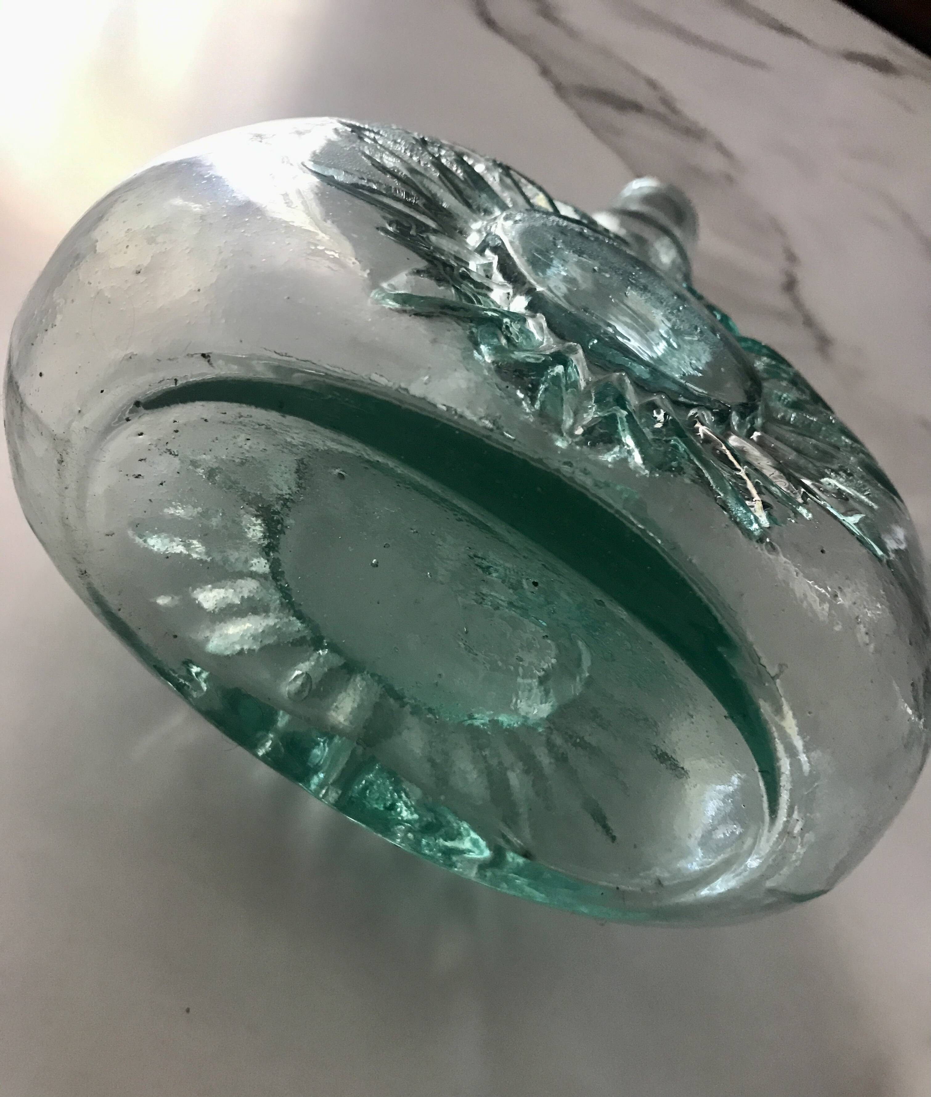 Bouteille vintage embossage soleil