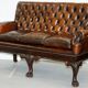 Chesterfield leather canapé in Georgian style with lion paw carved feet.