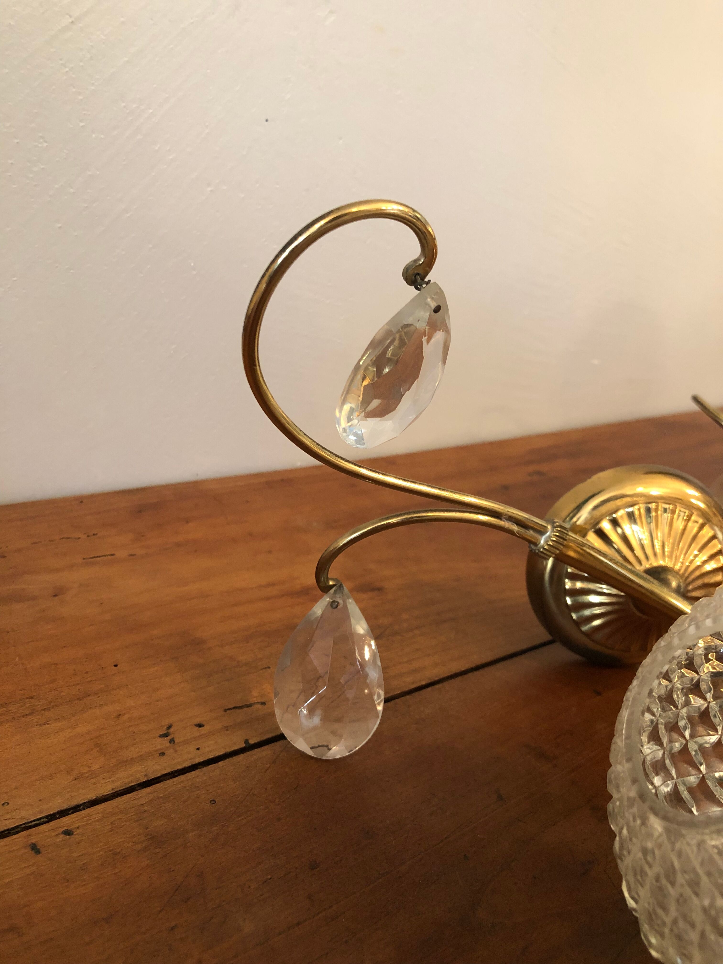 Duo of brass and glass wall lamps