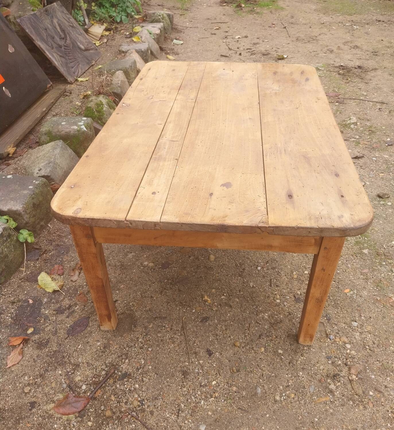 Wooden coffee table with a drawer