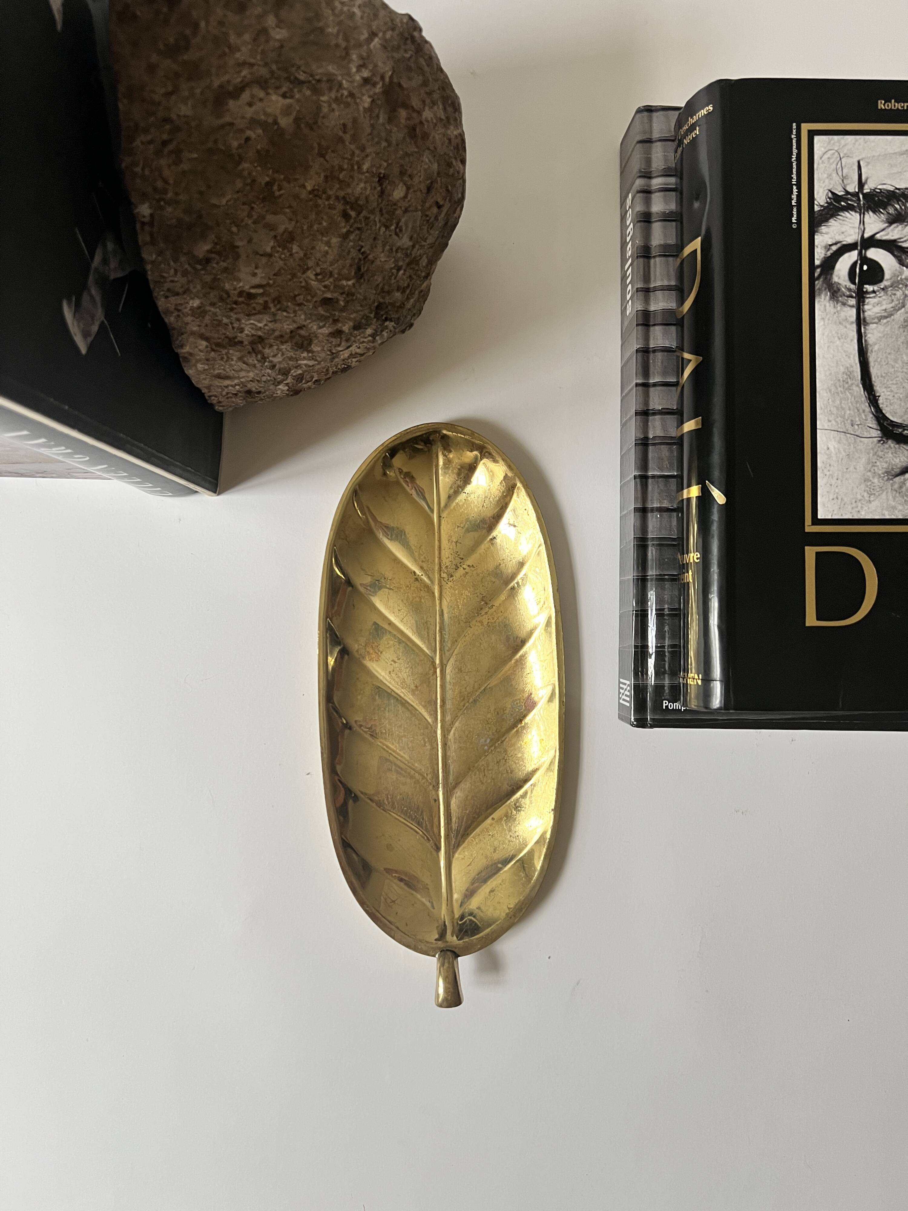 Brass leaf-shaped catchall, signed Christofle.
