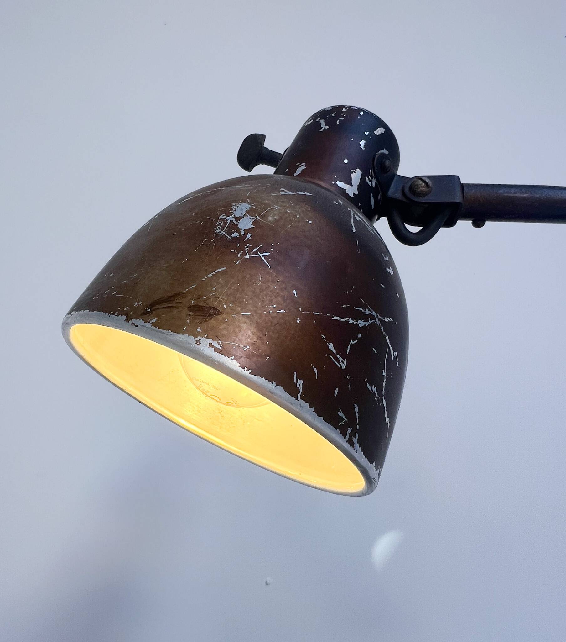 Industrial in height to be adjusted vintage clamp lamp from the 1970s