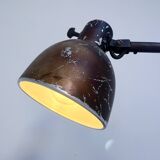 Industrial in height to be adjusted vintage clamp lamp from the 1970s