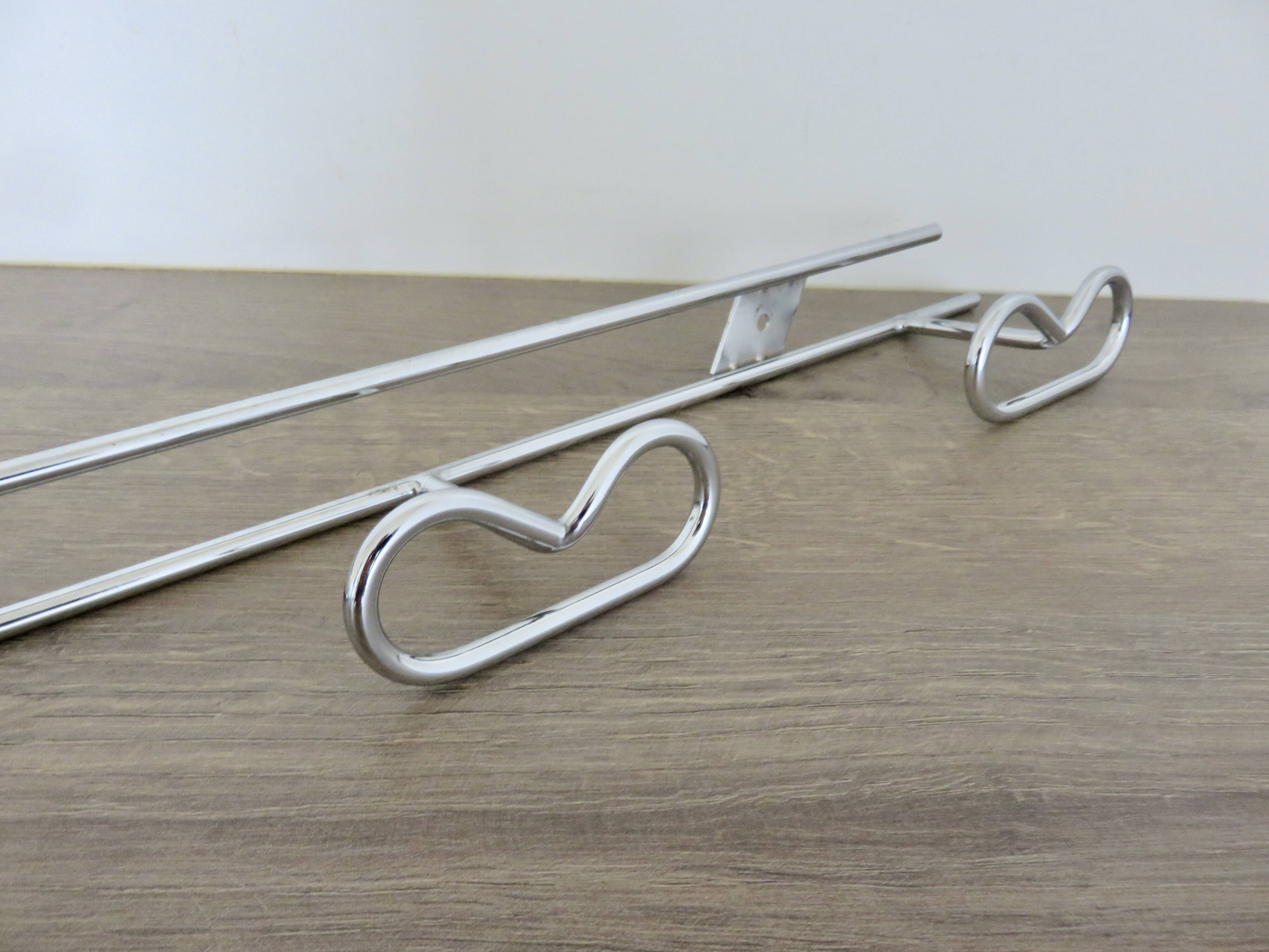 Large vintage wall-mounted coat rack in chrome metal