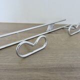 Large vintage wall-mounted coat rack in chrome metal
