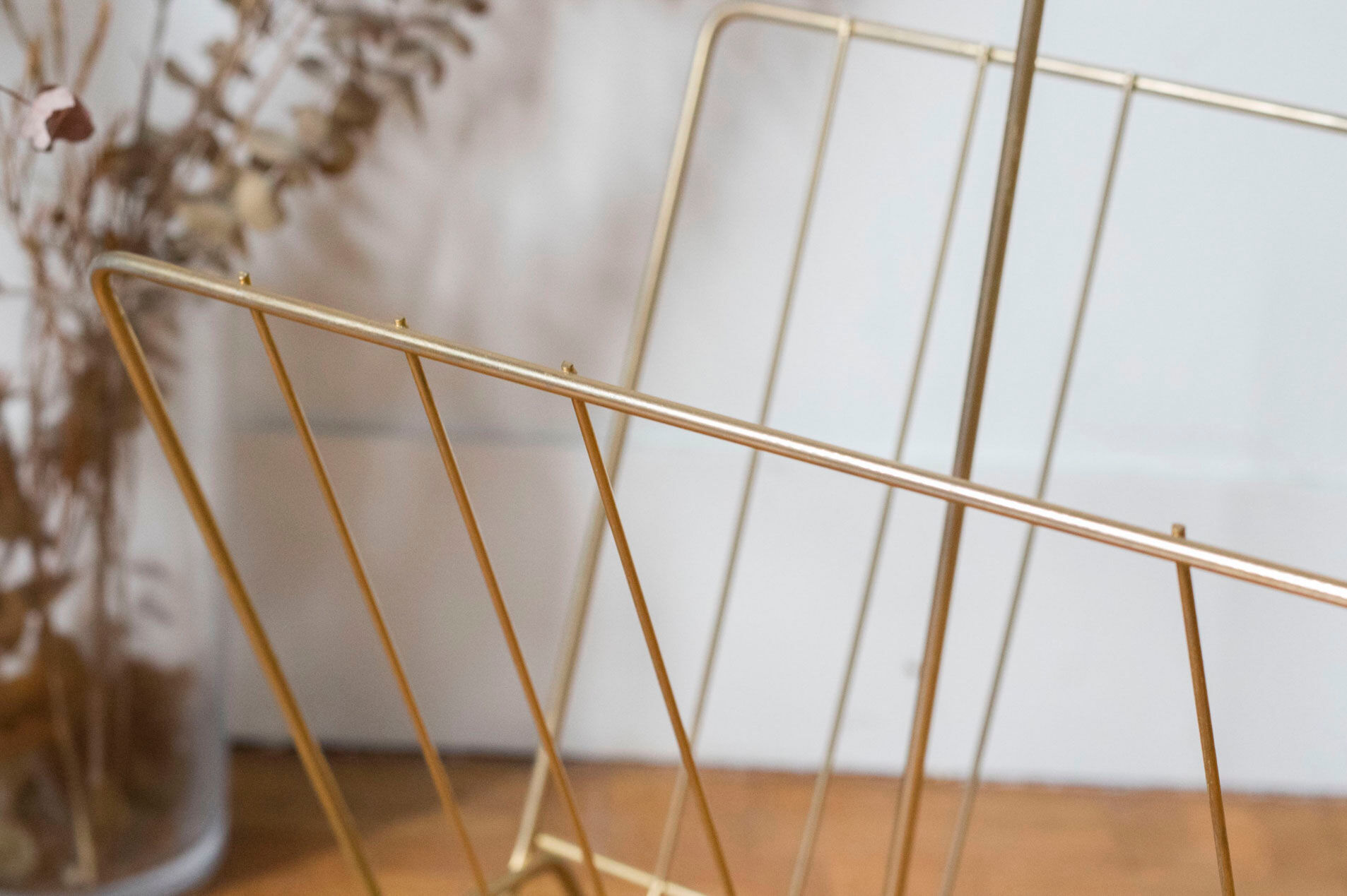 Vintage magazine holder in gold metal