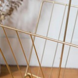 Vintage magazine holder in gold metal