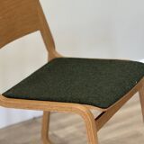 A set of four chairs in light oak (Theo chairs by Chorus)