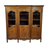 Large Provençal library in Louis XV style made of oak from the 20th century.