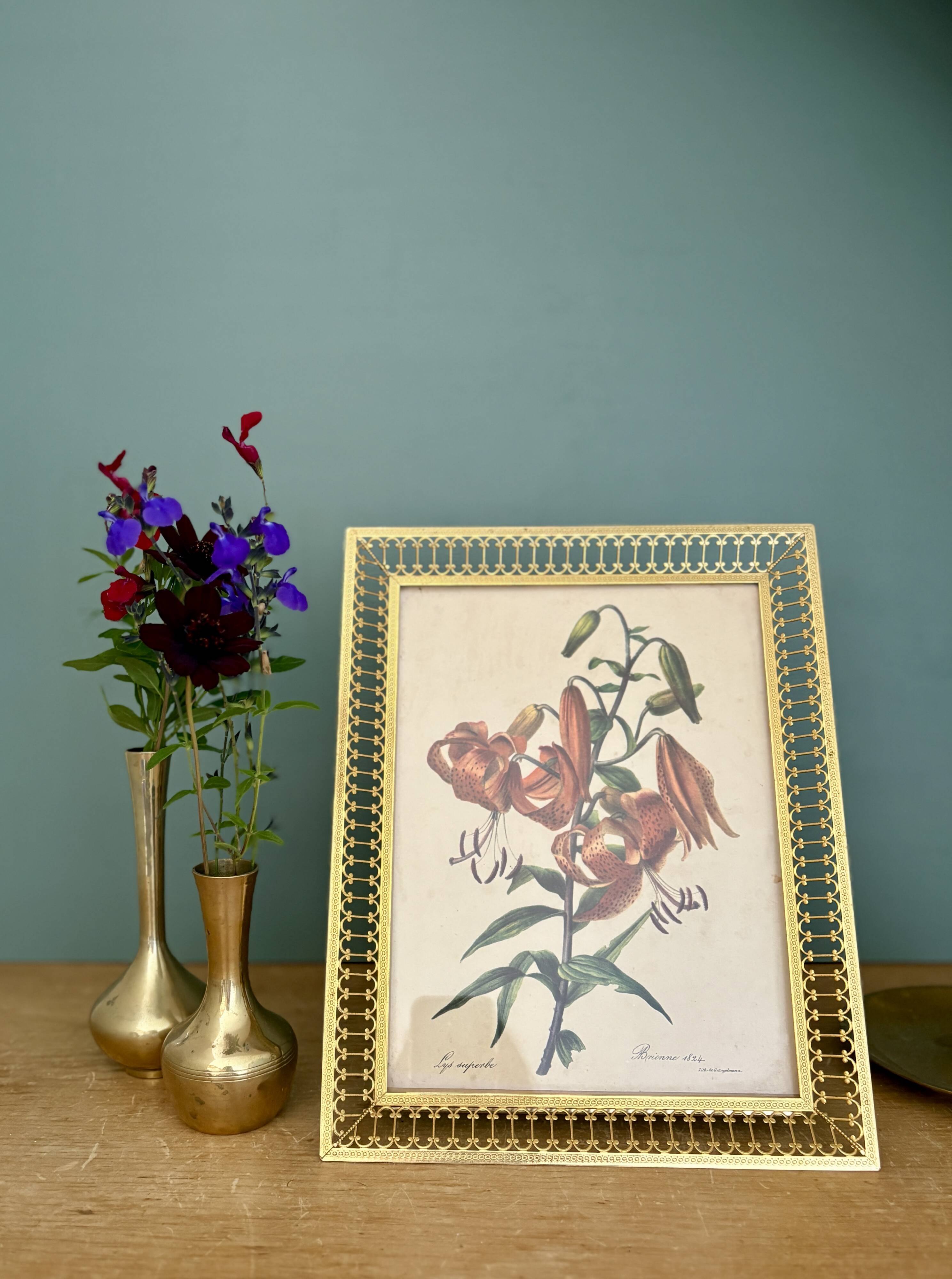 Antique gilt metal frame with flower engraving