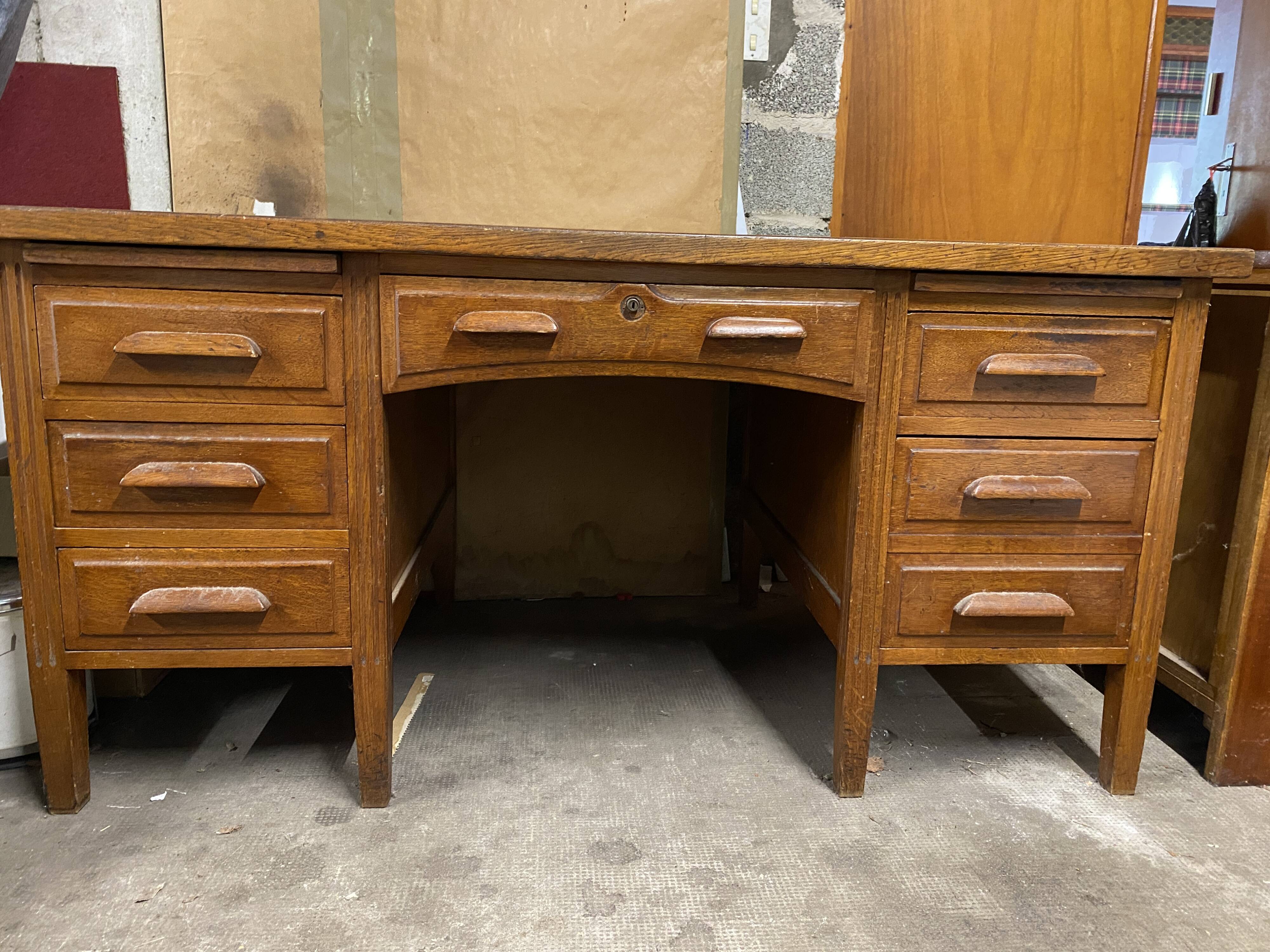 Teacher's desk from the 1950s on legs.