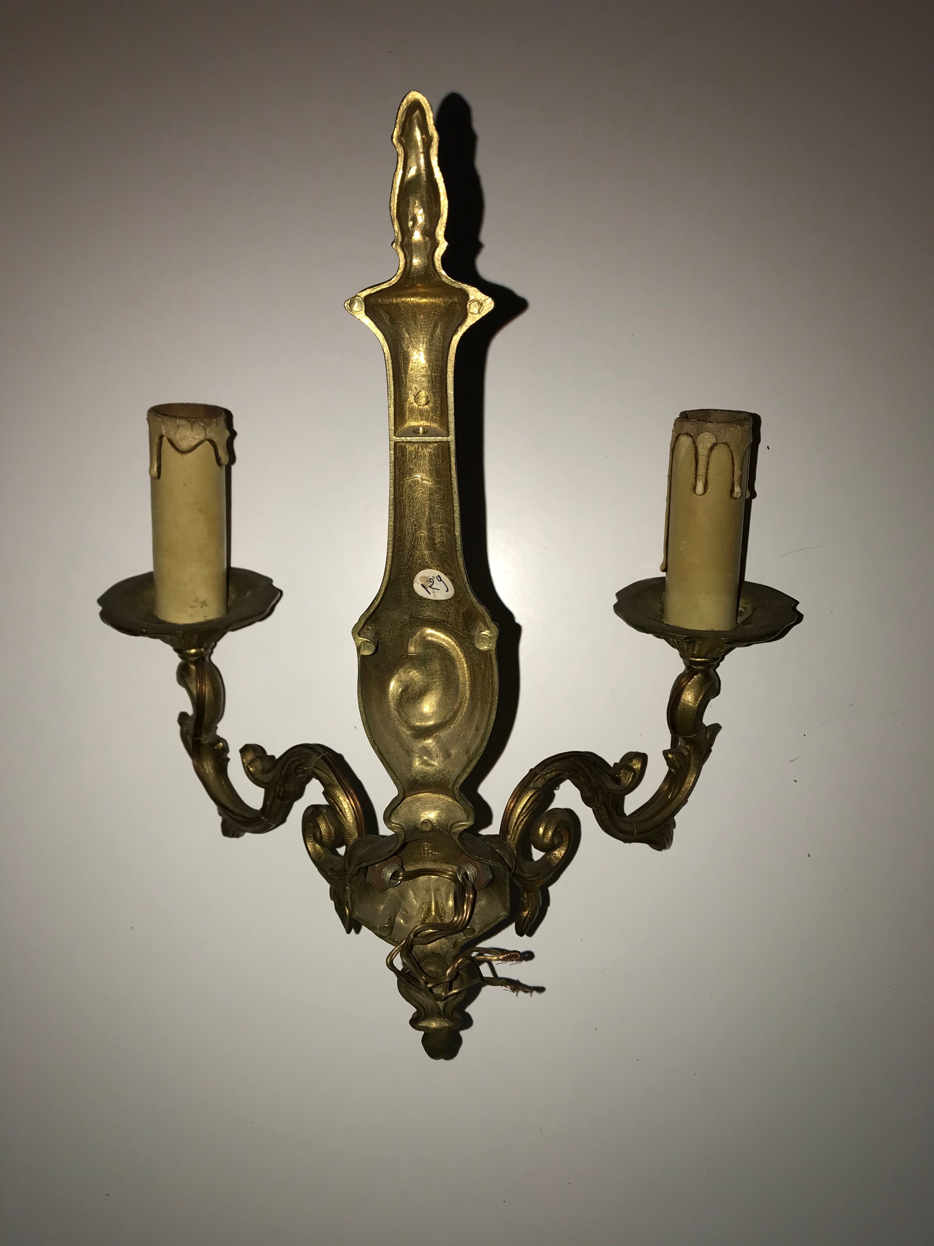 Pair of Louis XV style bronze wall sconces