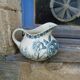 Jug in faience motifs flowers and insects