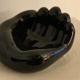 Black ceramic ashtray left hand