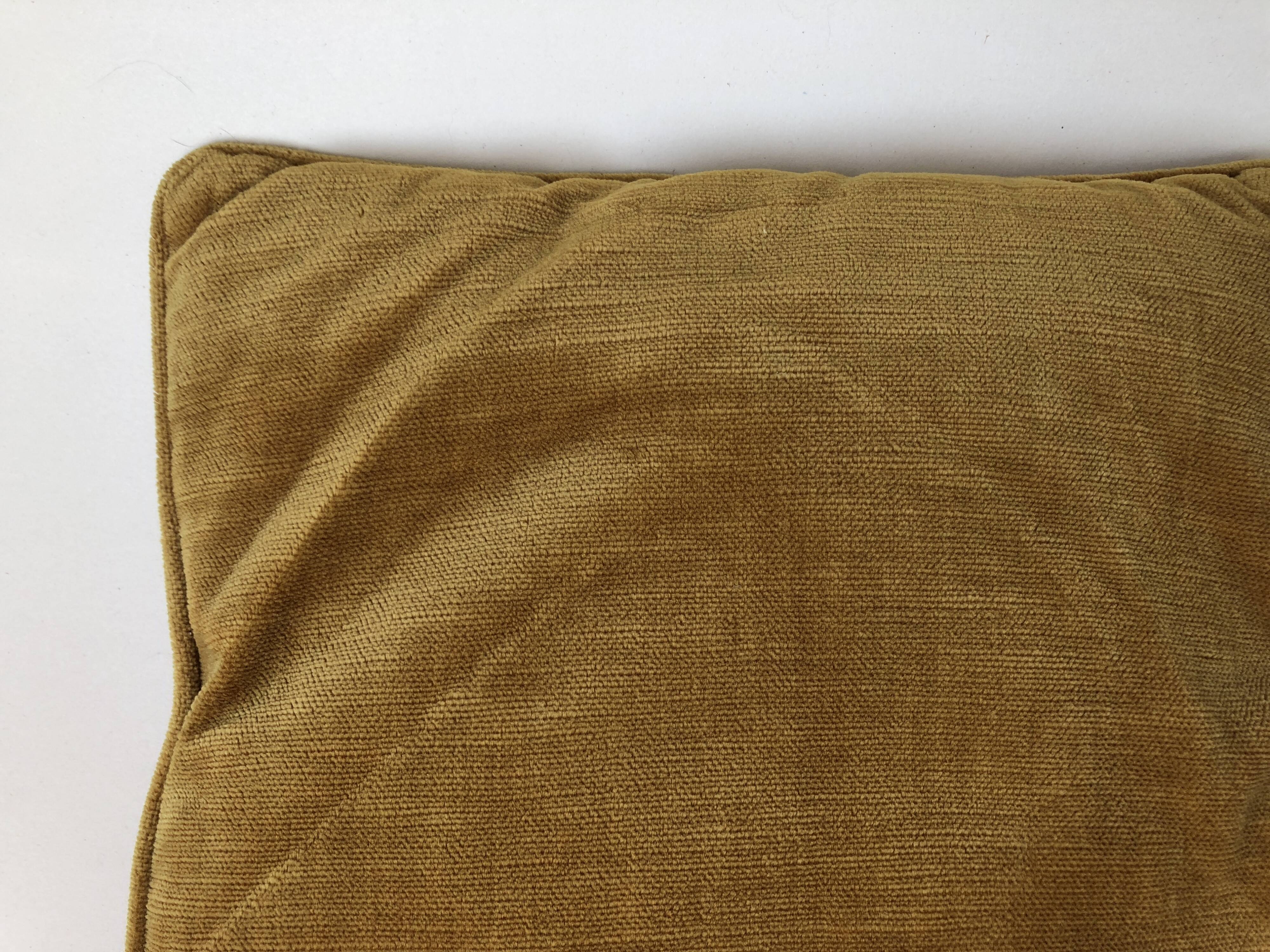 Golden yellow color velvet cushion