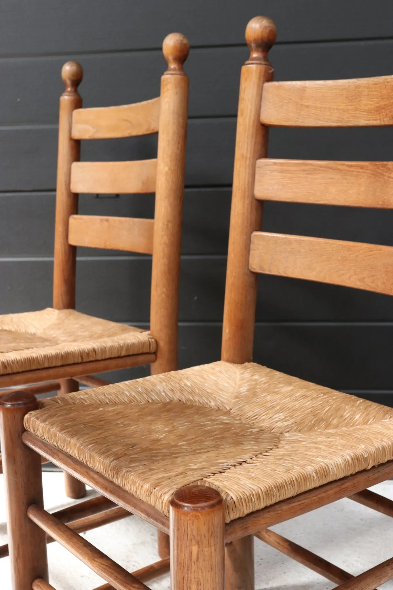 Set of four French ladderback chairs with rush seats – circa 1960