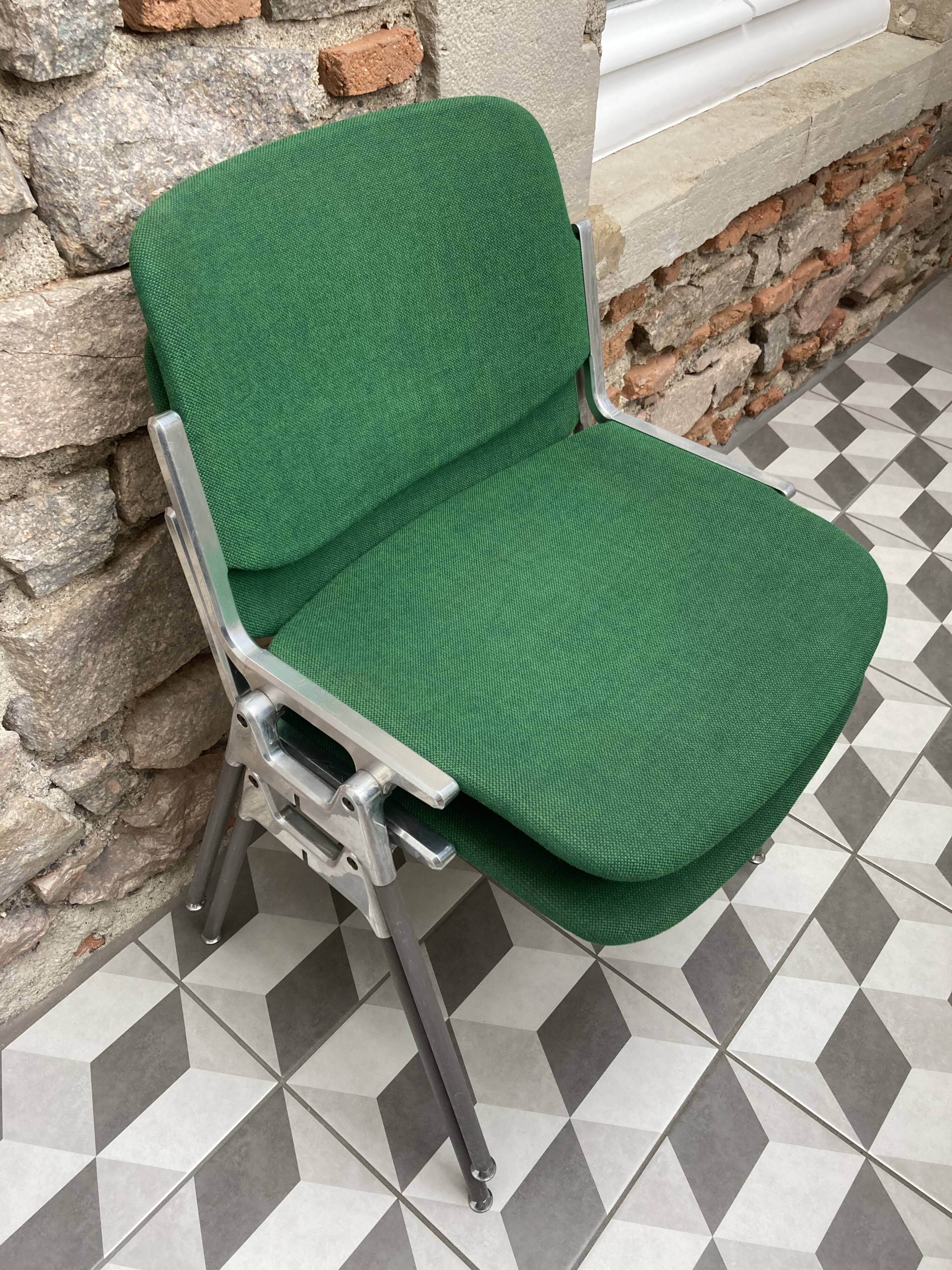 Pair of green DSC 106 chairs by Giancarlo Piretti