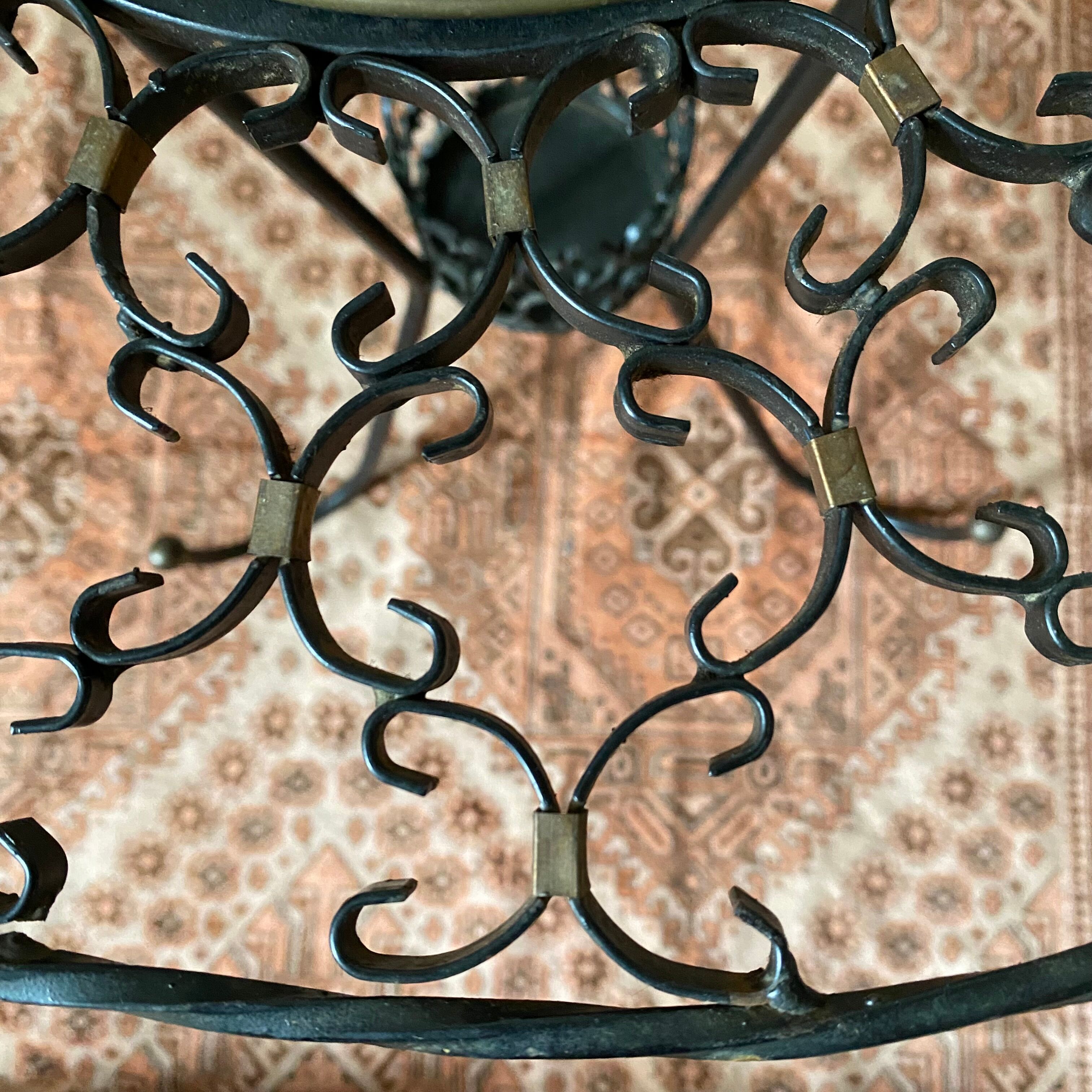 Wrought iron plant holder table from the 1950s