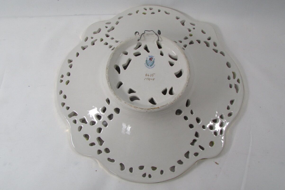 Capedimonté openwork plate, 4 seasons putto