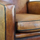 Art Deco sheep leather armchair with a lot of character