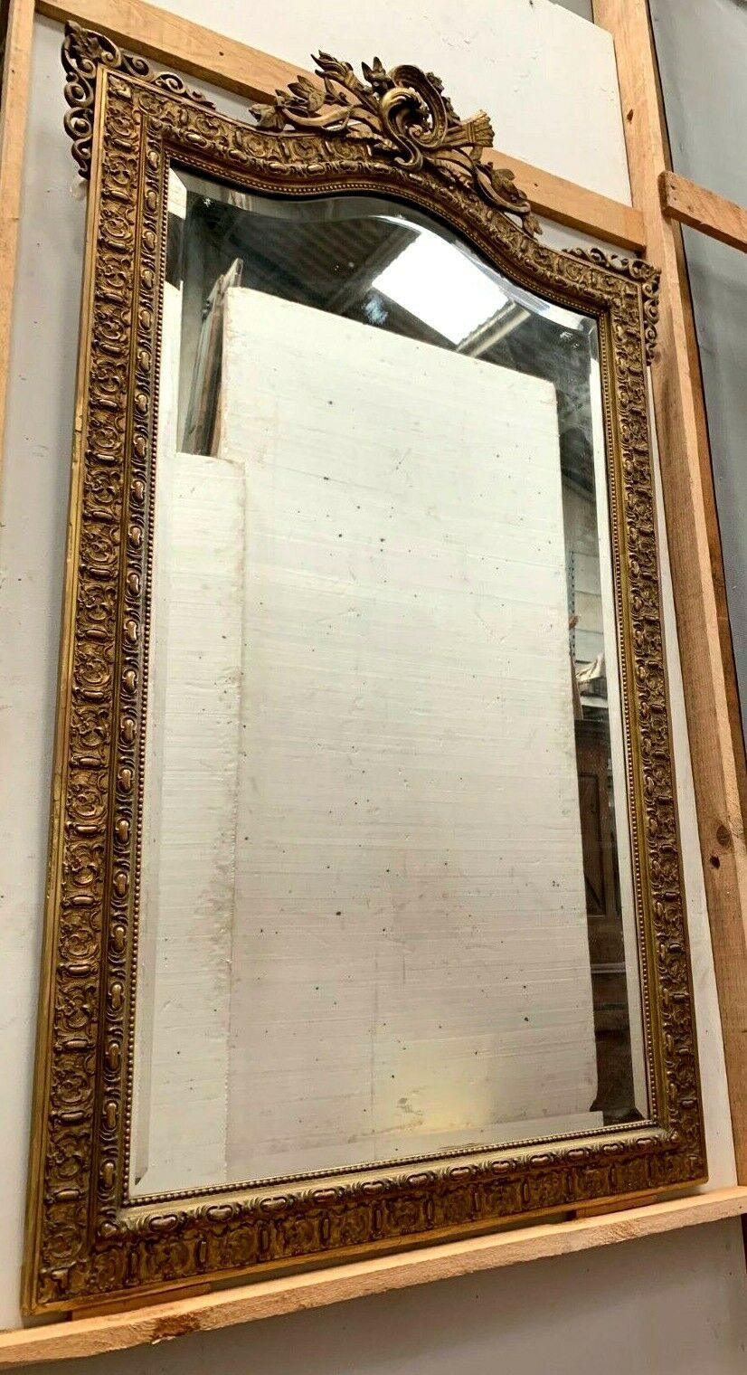 20th century Louis XV style mirror in wood and gilded stucco