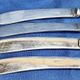 4 antique butter spreading knives in silver-plated metal and mother-of-pearl.