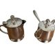 Two small silver-plated metal tea service pots from the 20th century.