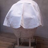 Wicker and painted wood baby cradle