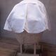 Wicker and painted wood baby cradle