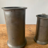 Pitchers in tin