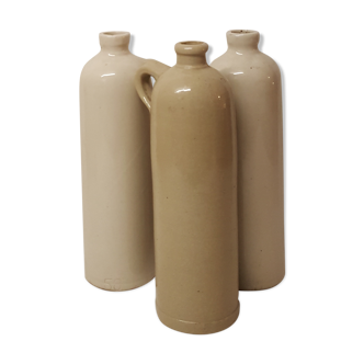 3 sandstone bottles